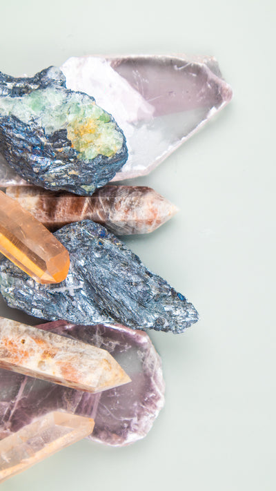 Collection of Rare crystals found at the Tucson Gem show 2024 by Energy Muse, including Selenite Lithium, Pink Lemurian, Stibnite and Moonstone with Sunstone 