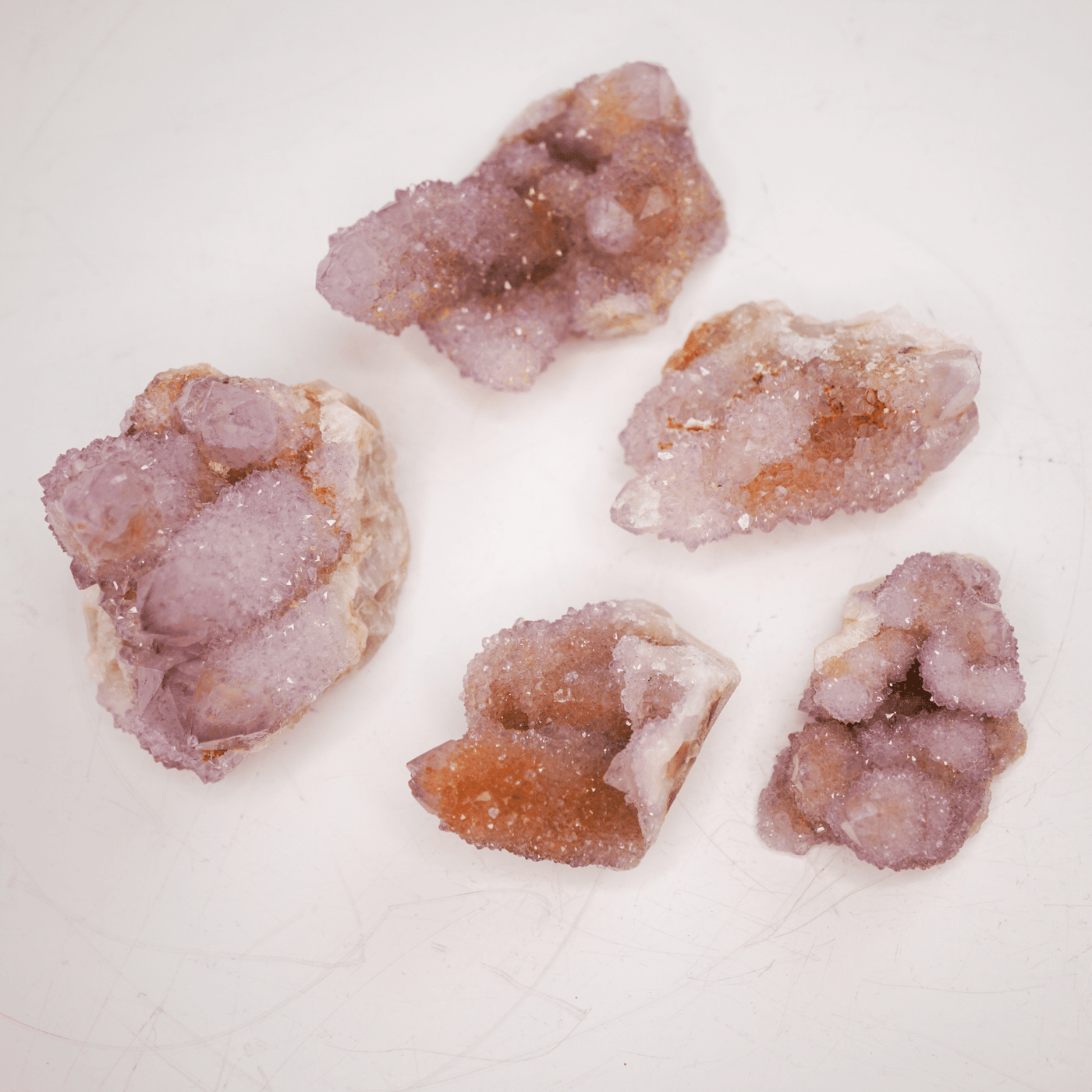 Assortment of 5 cactus spirit quartz displaying the variety of sizes, colors, patterns and shapes by Energy Muse
