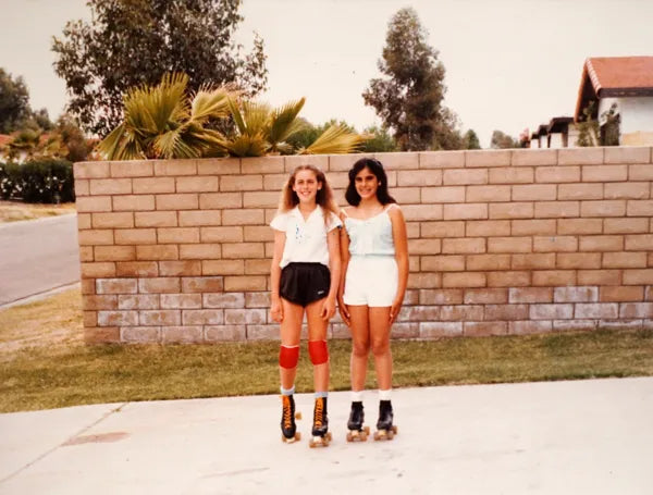 Heather and Timmi as girls, on roller skates