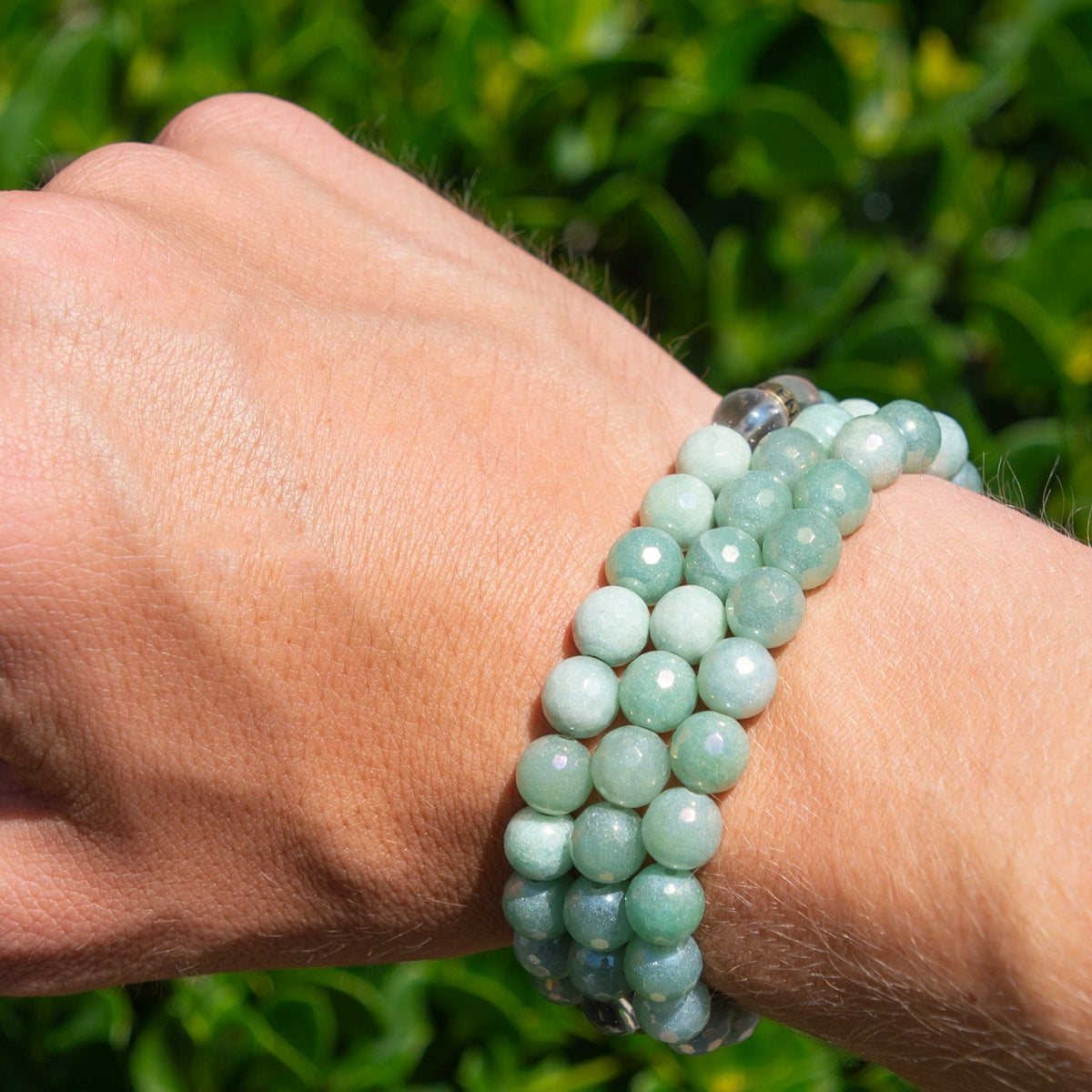 man wearing three aura aventurine bead stretch bracelets by Energy Muse