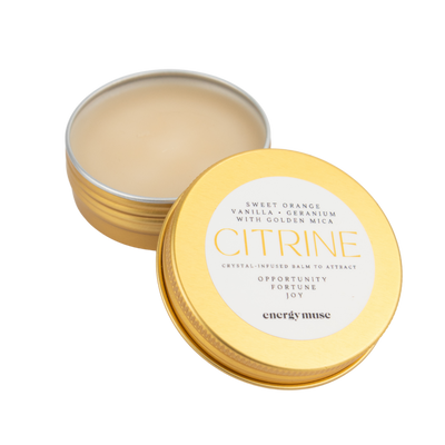 open gold tin of citrine lip balm by Energy Muse