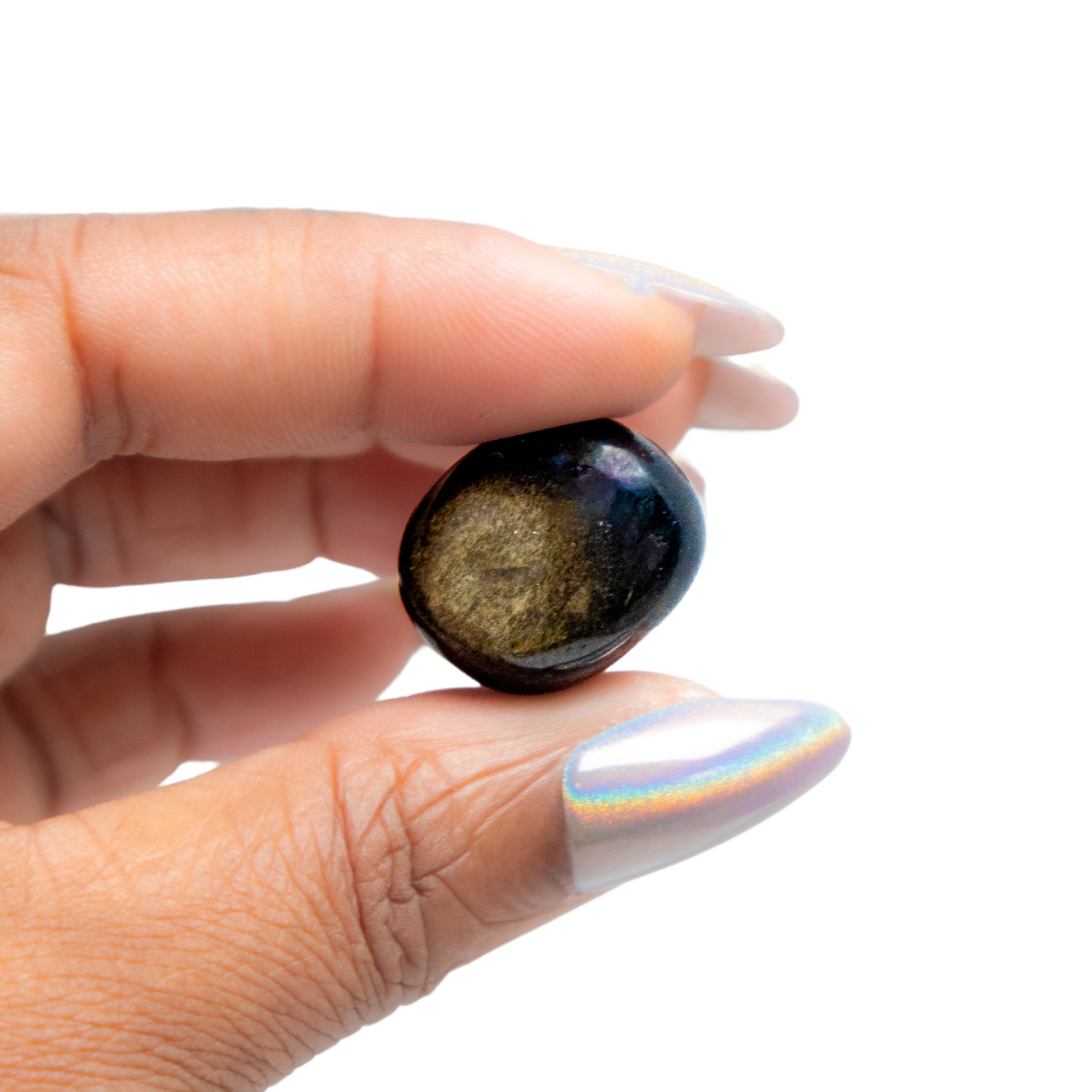 Woman holding golden sheen obsidian tumbled stone - Energy Muse
