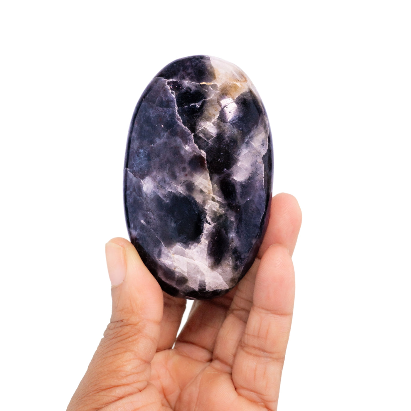Woman holding Iolite Sunstone Touchstone by Energy Muse