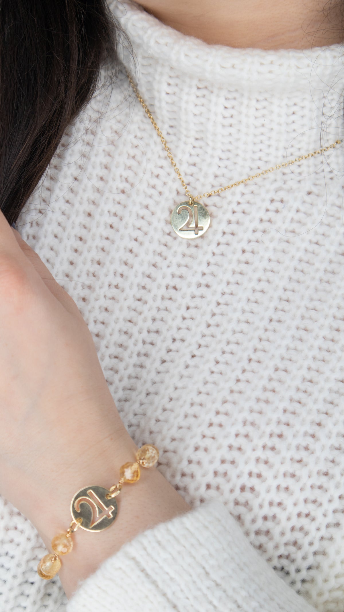 Woman wearing Jupiter Necklace and Jupiter Bracelet by Energy Muse