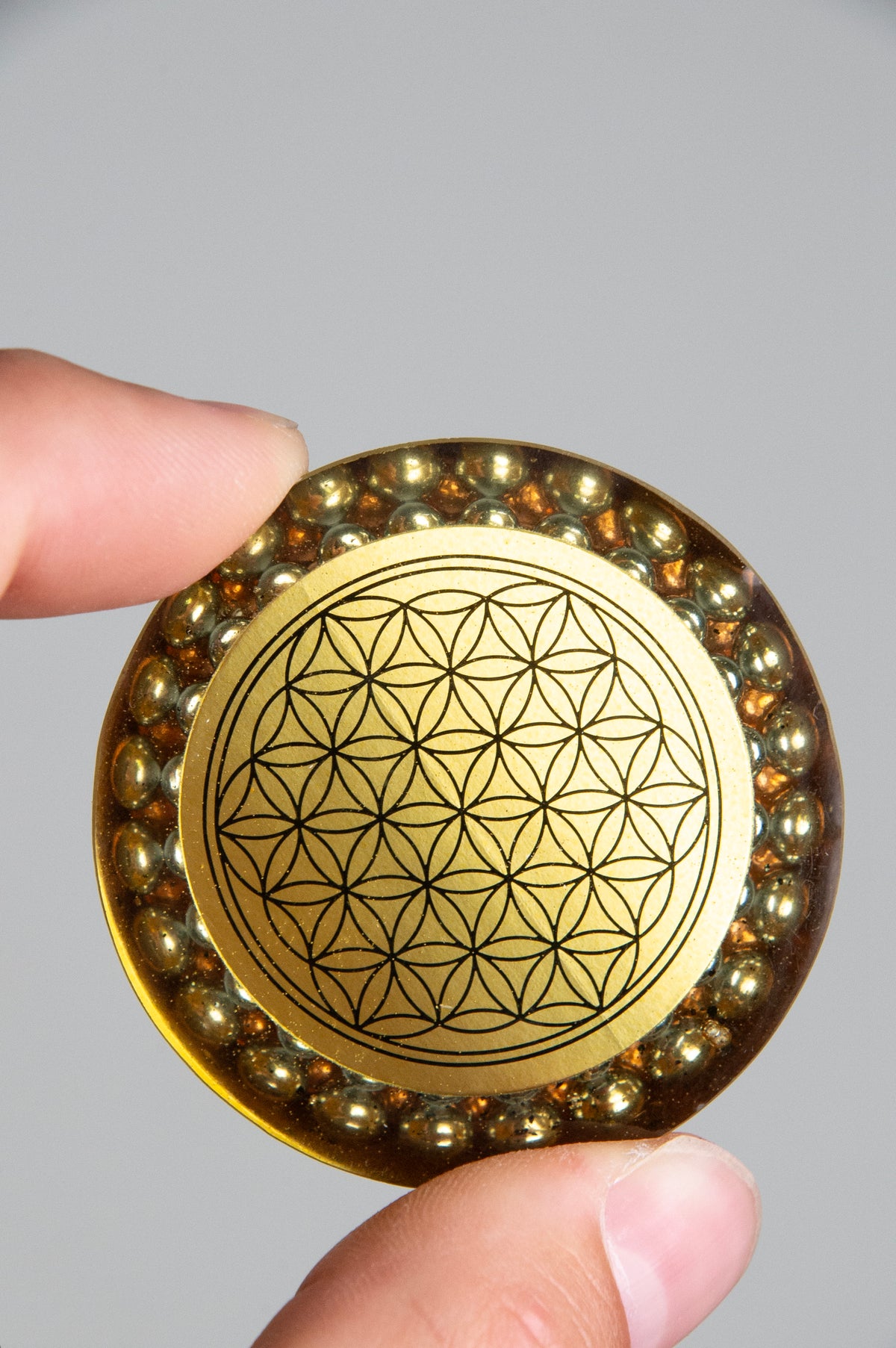 Flower of Life Rainbow Hematite Orgone Puck