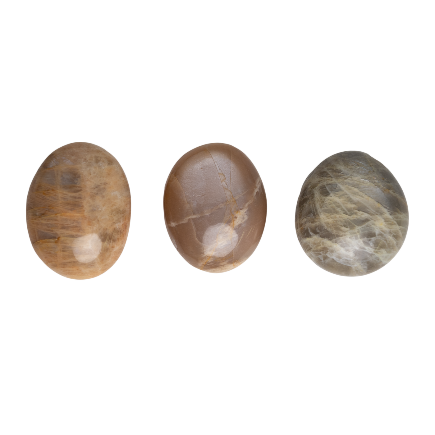 variety shot of 3 polished Peach Moonstone touchstones illustrating variety of coloring, patterns, and size by Energy Muse