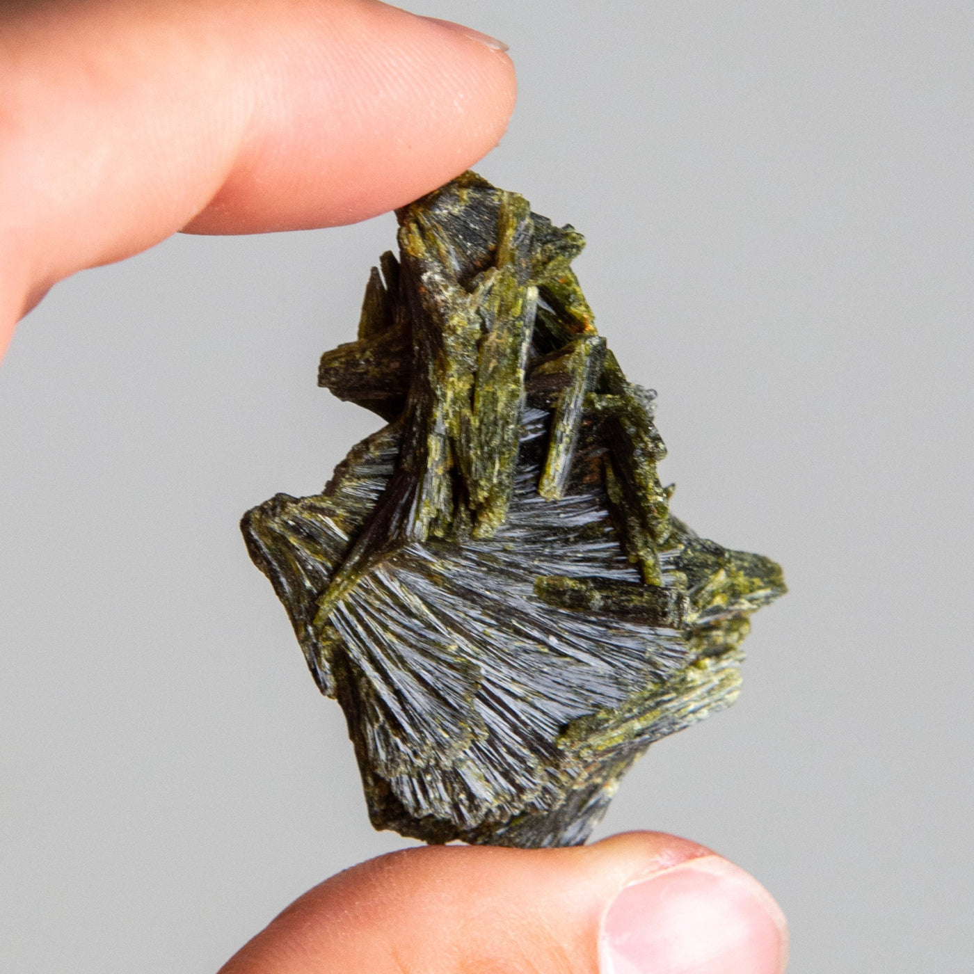 close up of closeup of raw epidote crystal by Energy Muse