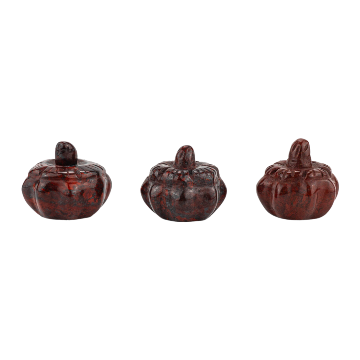 Set of 3 genuine red jasper pumpkin carving crystals by Energy Muse that show the variations in pattern and color.