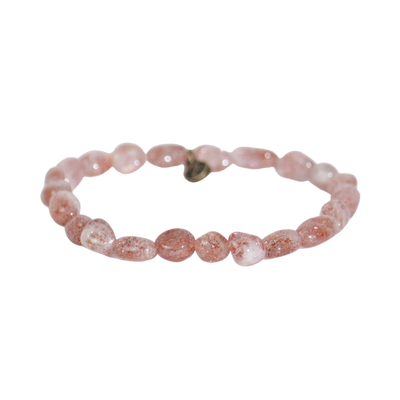 product view of genuine Sunstone crystal bracelet by Energy Muse with irregular pebble beads and elastic stretch body.