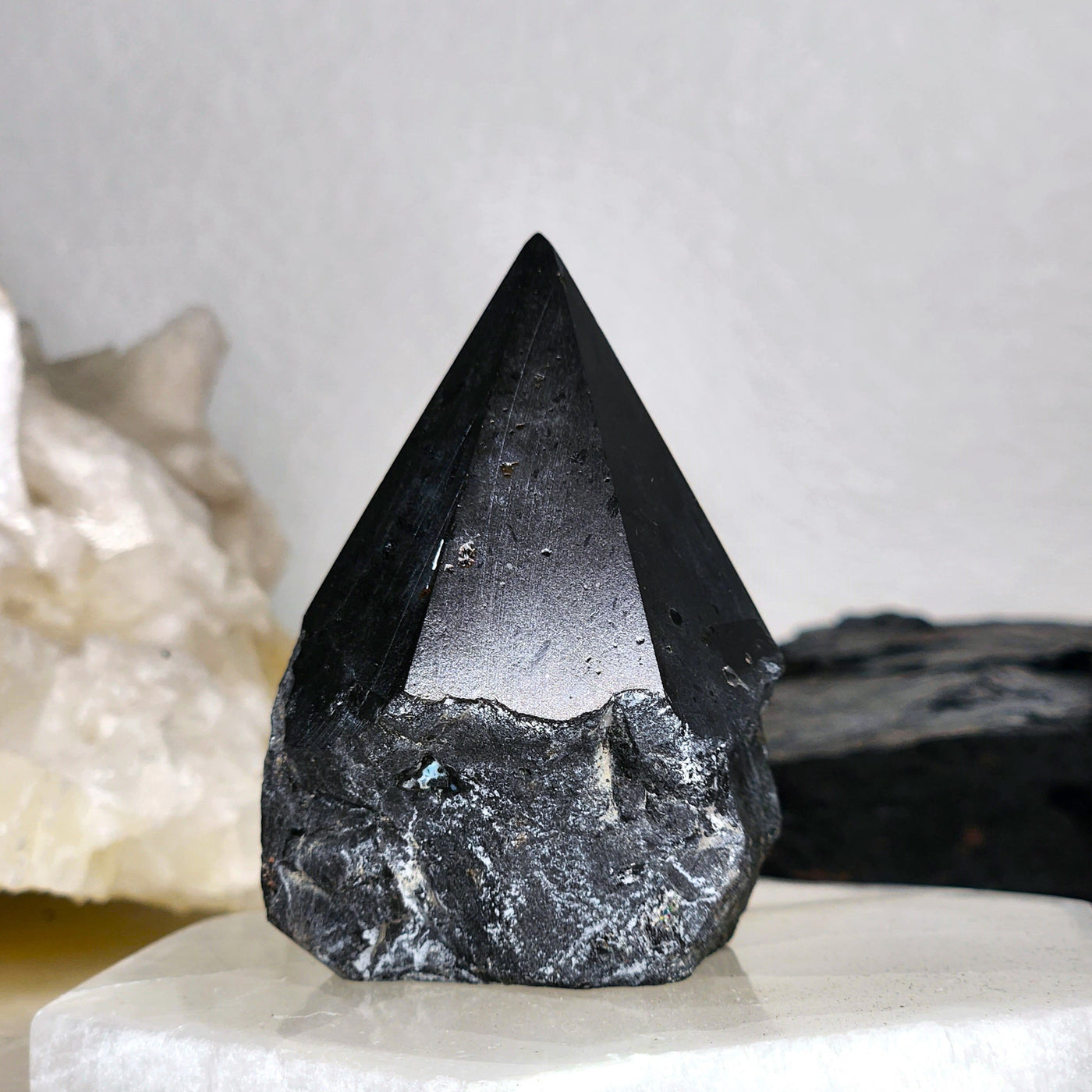 at-home view of half-polished Black Tourmaline point by Energy Muse