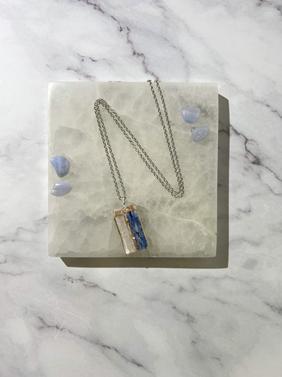 lifestyle view of genuine Blue Kyanite and Selenite pendant necklace by Energy Muse
