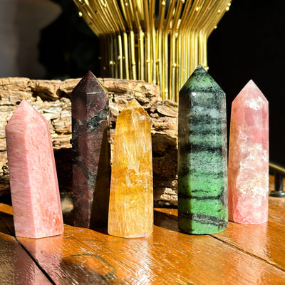 Collection of 5 different crystal points: Rhodonite, Garnet in Biotite, Yellow Fluorite, Ruby Zoisite and Rose Quartz by Energy Muse