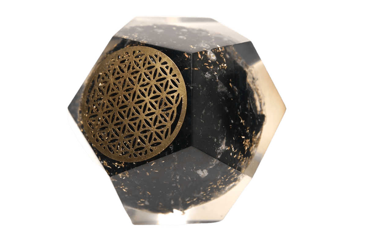 Angled view of Black Tourmaline Orgone Dodecahedron with metal Flower of Life decor by Energy Muse