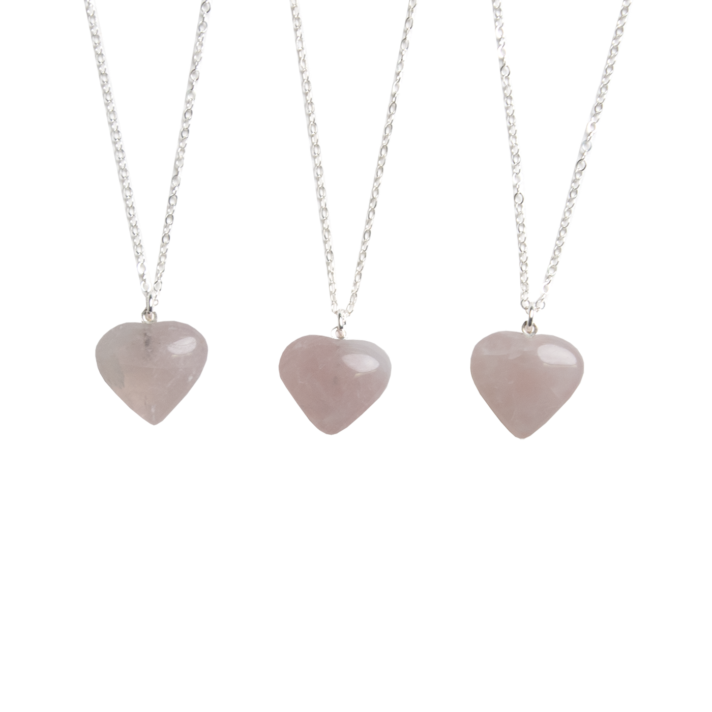 3 genuine Rose Quartz heart-shaped crystal pendant necklace on silver polished chain by Energy Muse showing variation