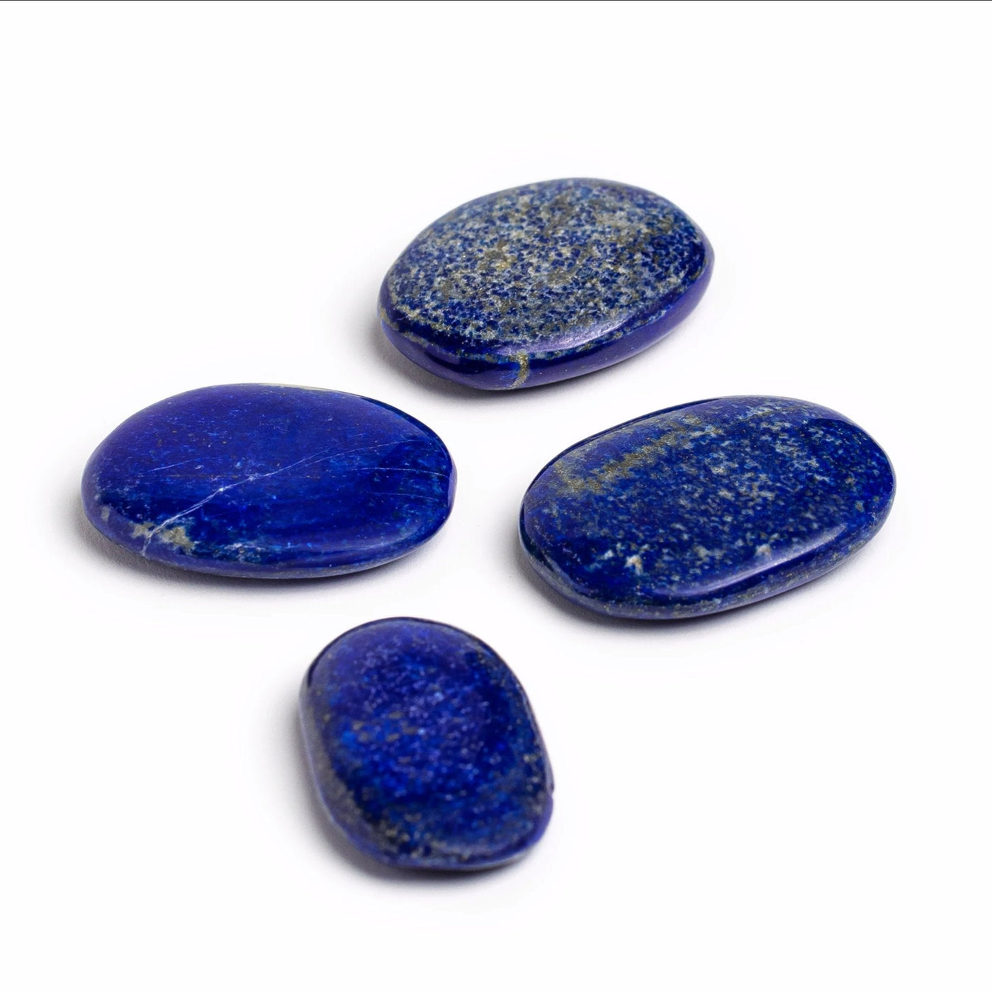 group of 4 genuine lapis lazuli by Energy Muse showing coloration variety
