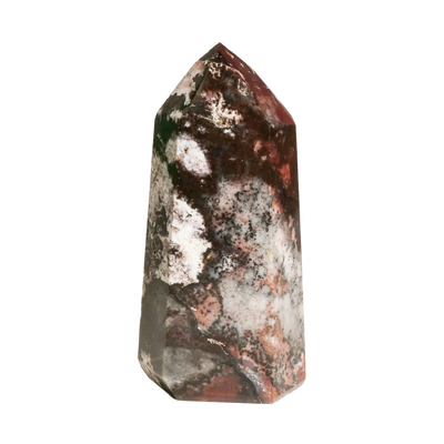 Closeup view of Energy Muse's genuine Mosaic Chalcedony healing crystal point displaying mottled and speckled irregular natural color pattern.