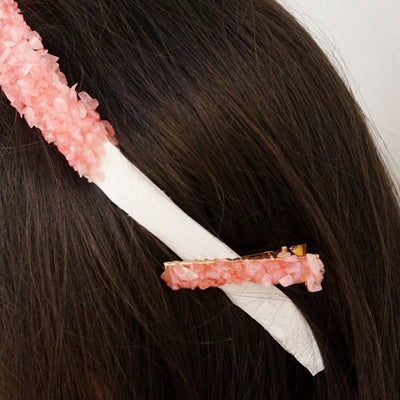 close up view of rose quartz clips holding rose quartz crown headband by Energy Muse