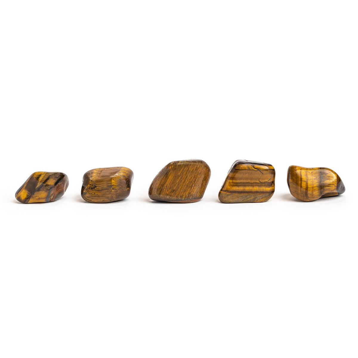 5 natural irregularly polished tumbled Tiger's Eye stones by Energy Muse illustrating the variation in size, color, and pattern. 